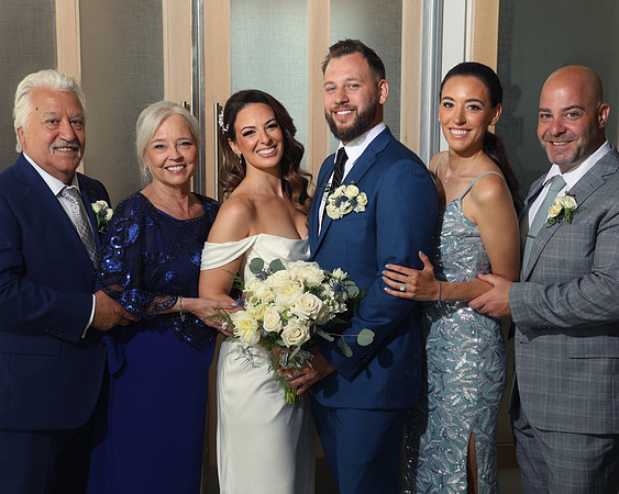 family of six with dad smile